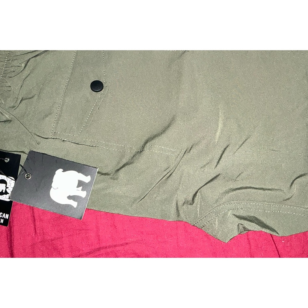 American Stich waterproof pants green, size large.